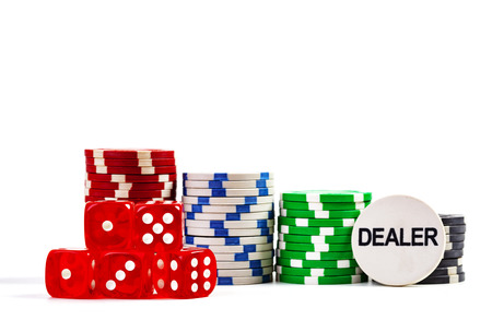 Casino Chips With Red Dice and Dealer Chip Isolated on White Backgroundの写真素材