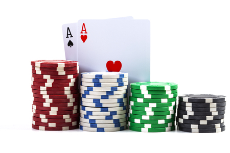 Two Aces with Casino Chips Isolated On White Backgroundの写真素材