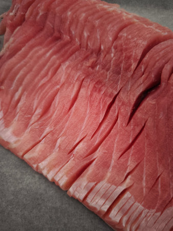 Thinly Sliced carp fillet lies ready for a festive Christmas meal, adding a touch of elegance to the holiday celebration in Pragueの写真素材