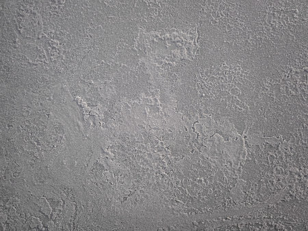 Prague, Czech republic - February 4, 2025: Dark gray concrete wall texture background showing rough surface in vysocany districtの写真素材