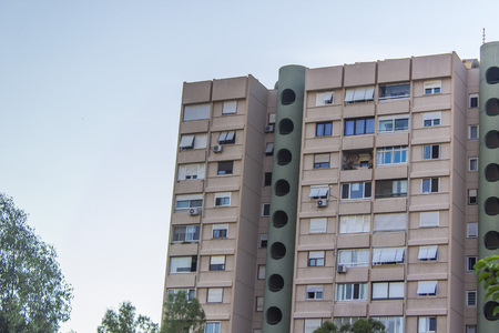 Perspective long shot of old urban reinforced mass constructed modern building with blue sky in Izmir at Turkeyの写真素材