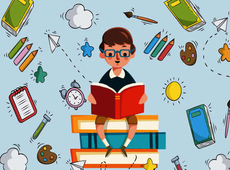 kid is reading a red book with knowledge objectsの写真素材