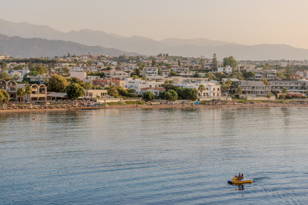 Cityscape at sunset, Agioi Apostoli, Chania, Crete, Greece.の写真素材