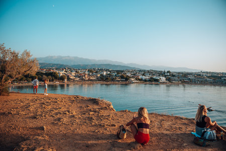 Cityscape at sunset, Agioi Apostoli, Chania, Crete, Greece.