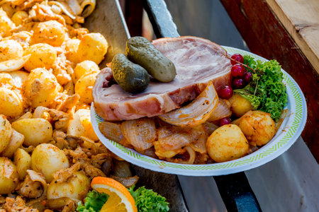 Festival of street food. Various kinds of food served on stainless steel trays. A place to eat for ordinary people. Folk food.の写真素材