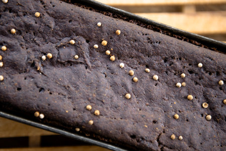 Close-up of a freshly baked loaf of rye bread. This is a wheat-free rye bread made in a sourdough...