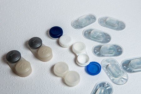 Contact lenses and case on white background, top viewの写真素材