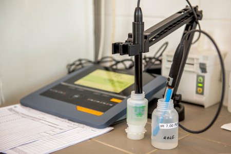 Laboratory equipment. pH meter with glass electrode for measuring pH in buffer solution. Analytical,...