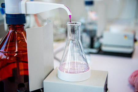 Manual titration station with brown bottle. Laboratory equipment, titration of permanganate index