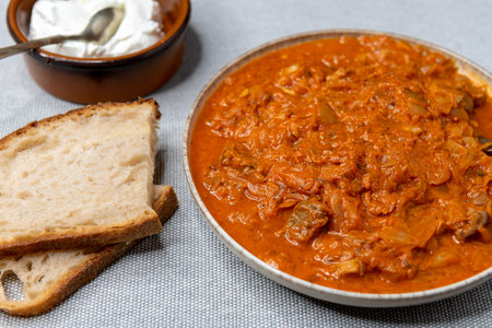 Traditional Hungarian Cabbage stew a la Szekely or Szekely goulash with bread.の写真素材