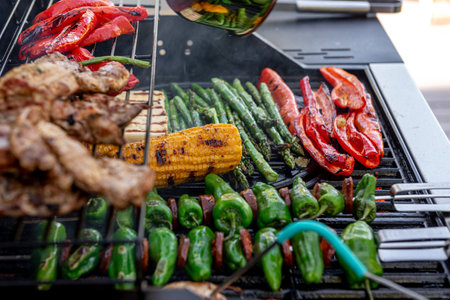 Grilled corn cobs, paprika and asparagus with temperature control.の写真素材