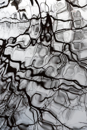 Reflections In Lake Water. Reflections of the water like an abstract paintingの写真素材