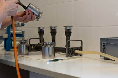 Disinfection and sterilization of stainless steel funnels by flame in a clean, controlled...