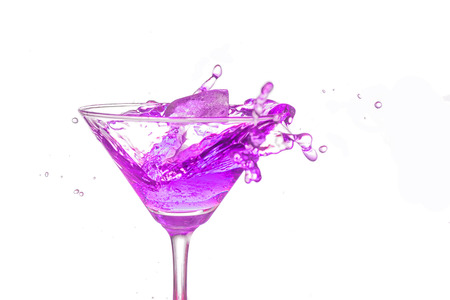 Purple cocktail splash on white background close upの写真素材