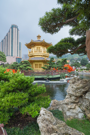 The oriental gold pavilion of absolute perfection in Nan Lian Garden, Hongkongのeditorial素材