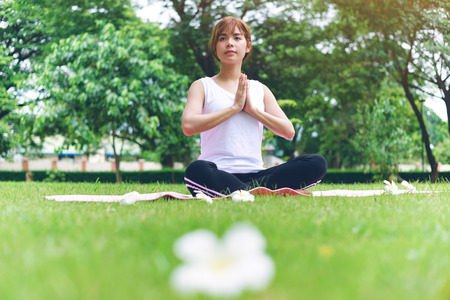 Woman Yoga relax in nature.Wellness and Healthy Lifestyle.の写真素材