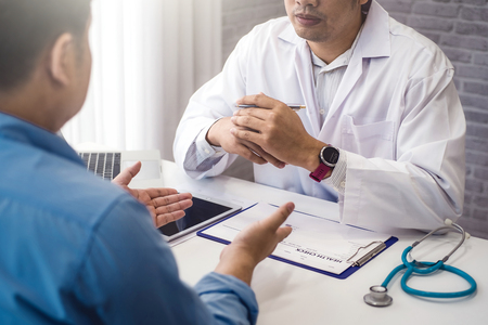 Doctor consultation with male patient health disease in medical clinic or hospital health. health and doctor concept.の写真素材