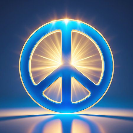 A bold blue peace symbol is the main element, emitting a powerful golden light from its core. Intense rays of light emanate outwards, creating a dynamic sunburst effect. The symbol has a bright yellow outline and is set against a dark blue background. A subtle reflection of the symbol and its light is visible on the surface beneath.の素材