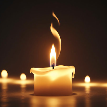 A close-up view of a single, lit candle with a gently flickering flame. The wax has melted and dripped down the sides, creating a textured appearance. The background is softly blurred, with the warm glow of other out-of-focus candles creating a bokeh effect. The overall mood is peaceful and intimate, with the warm light creating a sense of comfort and serenity.の素材