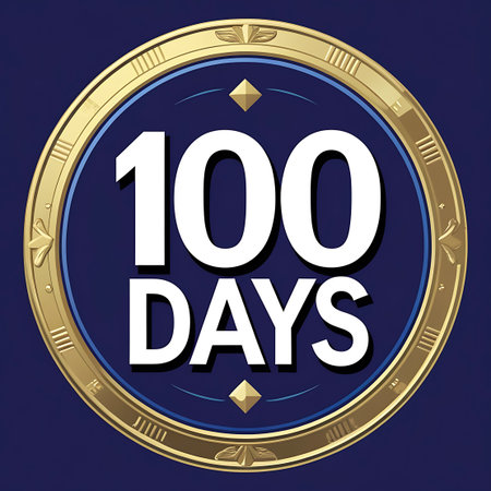 A circular emblem with a rich blue background and a prominent golden border. The number "100" is displayed in large white font on the upper half of the blue circle, with the word "DAYS" in white below it. The golden border is ornate, featuring decorative elements and a textured inner ring. Four small golden diamond shapes are positioned around the blue circle.の素材
