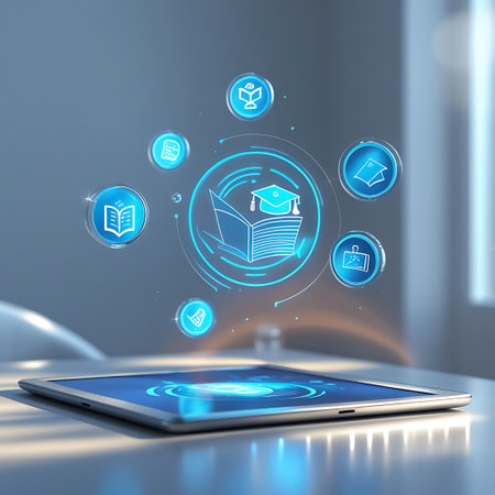 A tablet displays a glowing blue interface with concentric circles. Above the tablet, a cluster of blue digital icons floats in a circular arrangement. The central icon depicts an open book with a graduation cap, surrounded by smaller icons representing a book, a document, a briefcase, and a graduation cap. The background is a soft, out-of-focus gray with subtle light effects.の素材