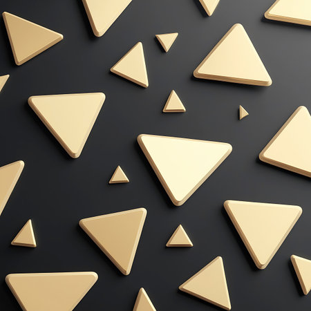 A dark, textured background serves as the canvas for a scattering of golden triangles. The triangles vary in size and are arranged randomly across the surface. They have smooth, rounded edges and appear to have a subtle three-dimensional quality, casting soft shadows. The overall composition is minimalist and modern, with the golden shapes creating an elegant and visually appealing abstract pattern.の素材