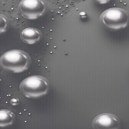 Grey showing scattered silver spheres and tiny beads on grey surface. High resolution image suitable for commercial use. Clear details and vibrant colors enhance visual appeal.の素材