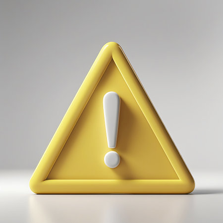 A 3D rendered yellow caution sign in the shape of a triangle. It features a bold white exclamation mark as the central graphic element. The exclamation mark is composed of a straight vertical bar and a circular dot positioned beneath it. The sign has a smooth, glossy finish with soft lighting that casts a gentle shadow.の素材