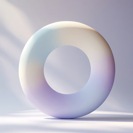 A smooth, rounded torus shape is presented against a soft, gradient background. The object displays a subtle color gradient, shifting from pale yellow to light blue and soft purple. Dramatic light rays cast shadows across the surface and the background, adding depth and a serene atmosphere. The composition is minimalist and abstract.の素材