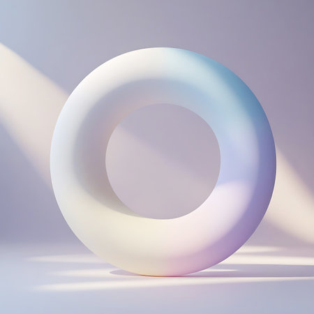 A soft, rounded torus object is centered in the frame, bathed in gentle light. The torus features a subtle pastel color gradient, blending shades of white, pale blue, and soft pink. Streaks of light fall across the object and the surface it rests on, creating a serene and ethereal mood. The background is a soft, out-of-focus gradient.の素材