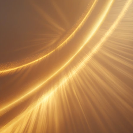 Abstract golden light arcs with a subtle shimmering particle dust effect create a luminous and ethereal background with a sense of gentle motion and warmth.の素材