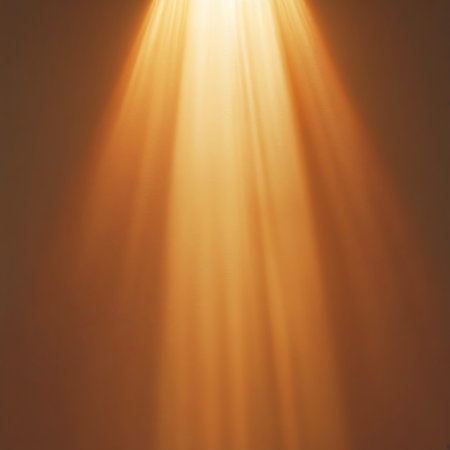 Soft, warm orange light rays descend in parallel lines against a muted, gradient background, creating a gentle atmospheric effect.の素材