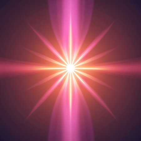 A symmetrical starburst of pink and orange light emanates from a bright white center against a dark, gradient background.の素材