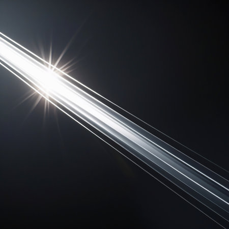 This image captures a mesmerizing display of light beams emanating from a central source. The bright, luminous light at the center radiates outward, creating multiple streaks of light that spread across the dark background. The contrast between the intense brightness and the surrounding darkness adds to the dramatic effect, evoking a sense of energy and illumination.の素材
