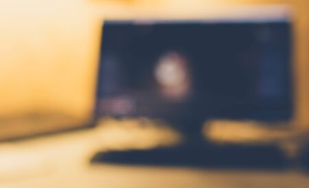 Beautiful blur of a personal computer in warm colorsの写真素材