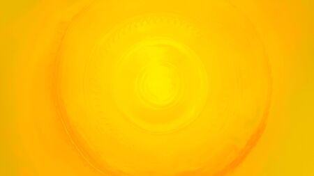 Yellow light through a glass jar.の写真素材