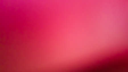 Light red crimson background with highlights in the center.の写真素材