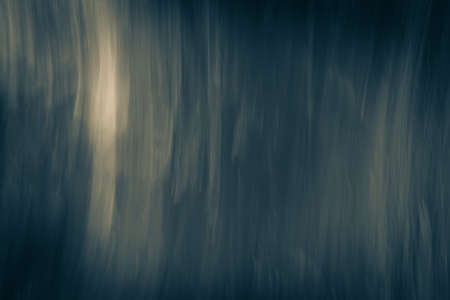 Abstract dark blue background with vertical highlights. Photo effect of vibration and movement.