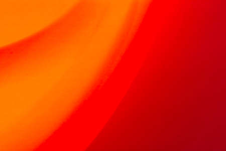 Red orange abstract gradient background with waves. Festive backdrop banner.の写真素材