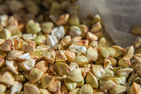 Buckwheat in a plastic bag close-up. Stocks of food. selective focusの写真素材