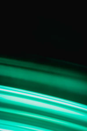 Vertical black green abstract background with semicircles. backdropの写真素材