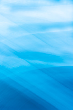 Blue vertical abstract background banner with wave lines crossing and soft gradient. backdrop