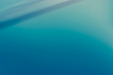 Abstract blue background with smooth lines and motion blur. Copy space. Backdropの写真素材