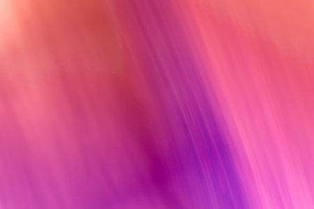Abstract image with gradient pink, purple and orange colors. The colors are blurred and blend into each other. A diagonal composition where the colors seem to flow from the upper left corner to the lower right, a soft and dreamy mood. Backdropの写真素材