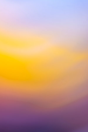 Colorful blurred abstract lilac yellow purple defocused background. Soft gradient. Backdropの写真素材