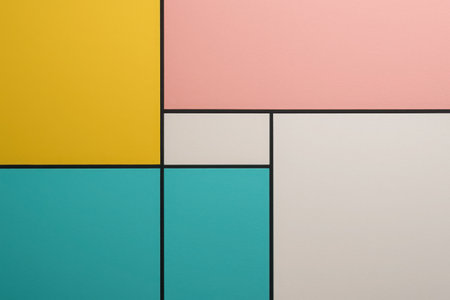 Brightly colored geometric shapes cover the wall of a modern room. The design includes segments of yellow, pink, turquoise, and white, creating a lively atmosphere.の素材