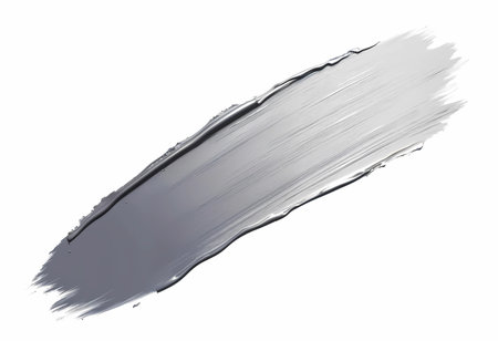 A bold silver paint stroke spreads across a white canvas, showcasing an elegant, fluid texture. This artwork expresses creativity and a love for contemporary design aesthetics.の素材
