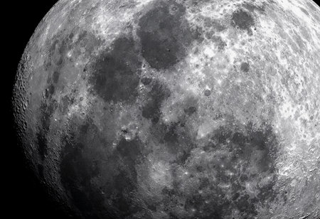 A luminous full moon fills the night sky, showcasing its cratered surface and glowing softly. The tranquil atmosphere evokes a sense of wonder and invites peaceful contemplation under the stars.の素材