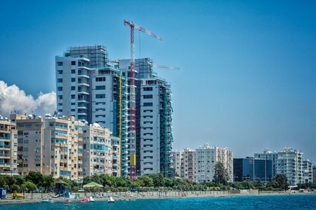 Hoisting crane is building house  Blue skyの写真素材