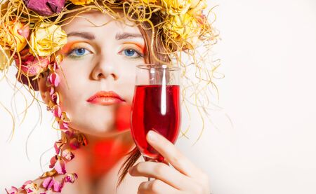 Beautiful young woman with breath on her headの写真素材